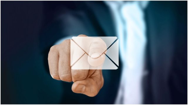 person pointing to email icon